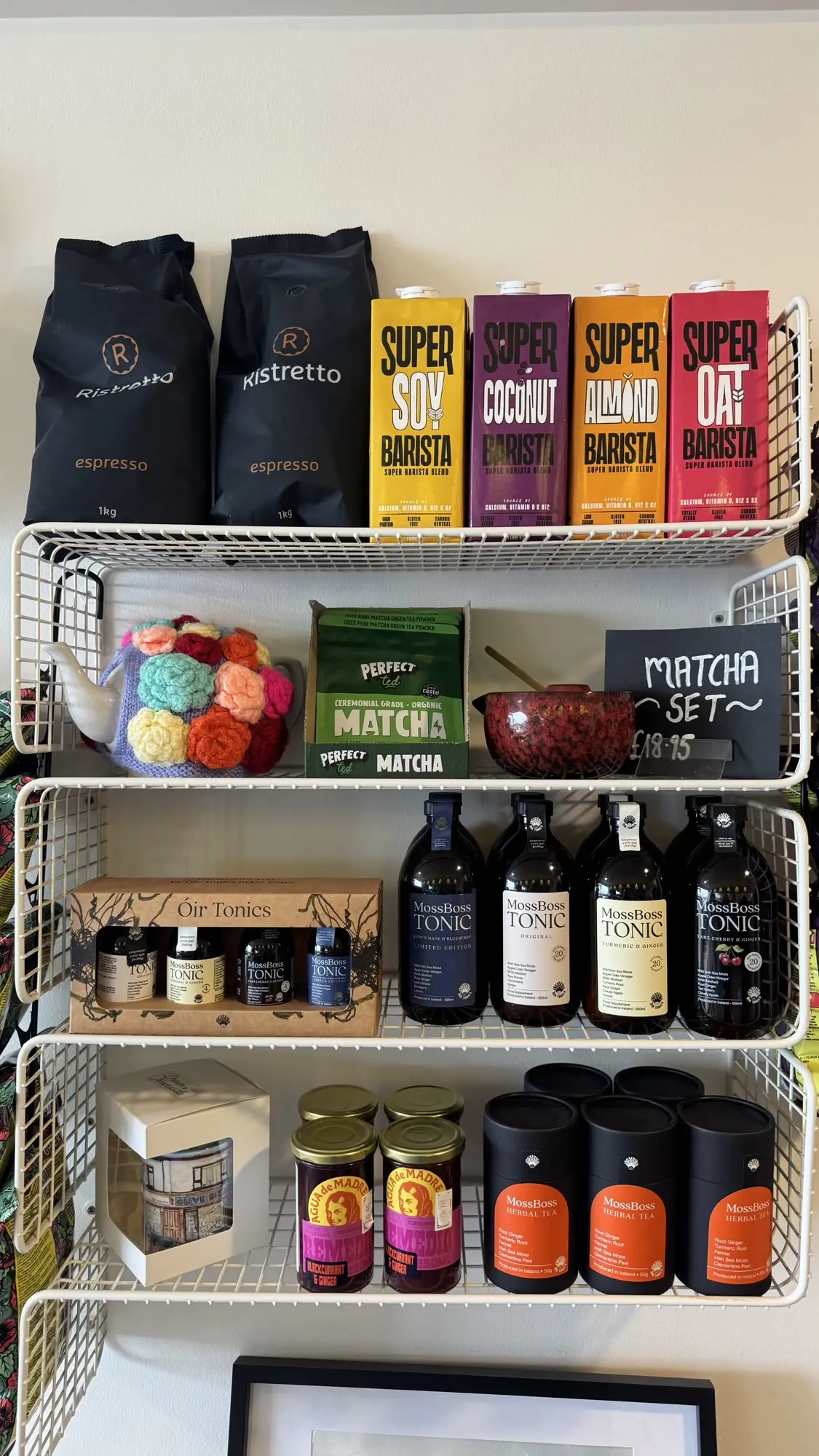 Shelves of coffee, matcha and treats for sale