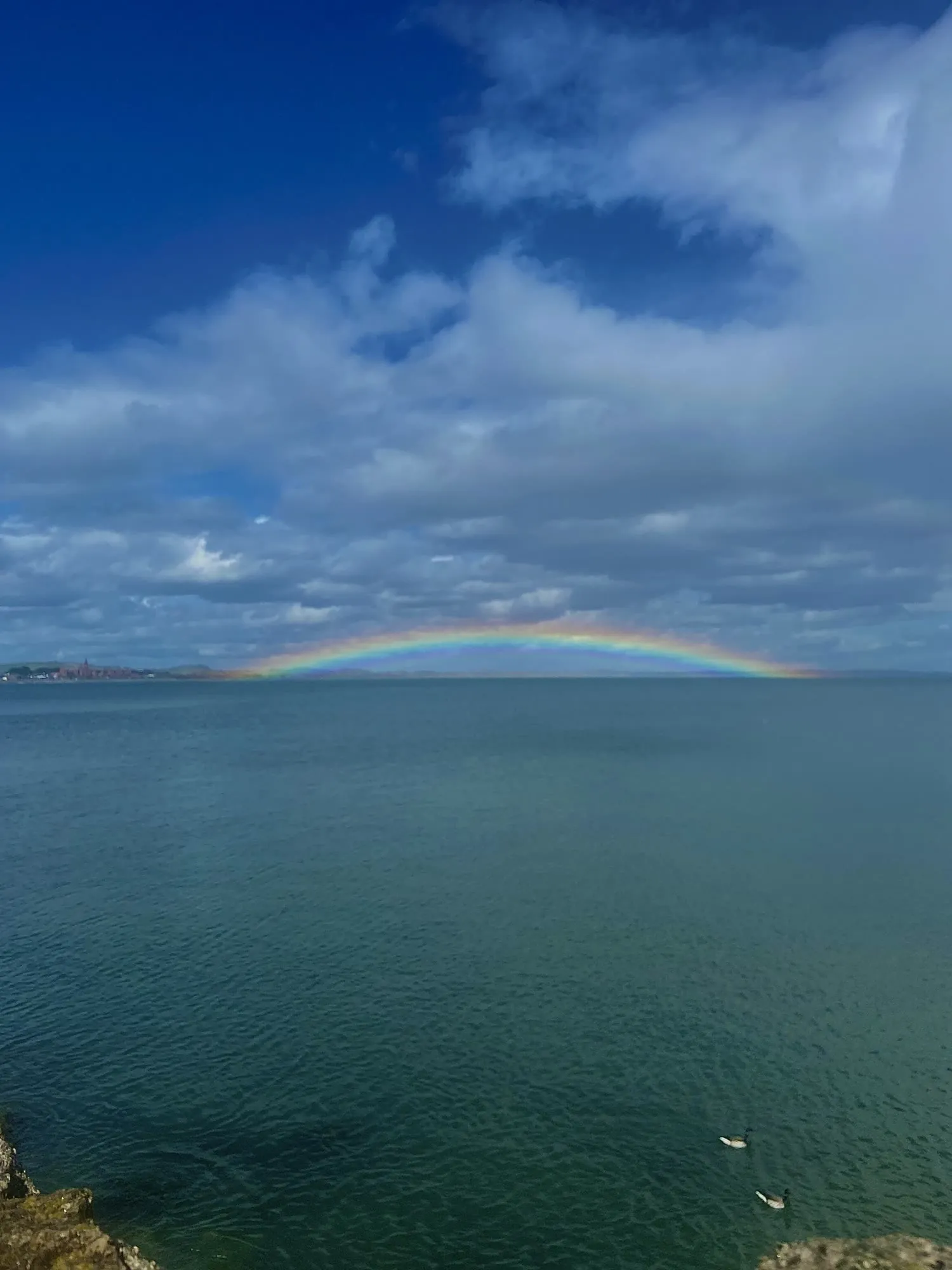 A rainbow over the sea at Newcastle