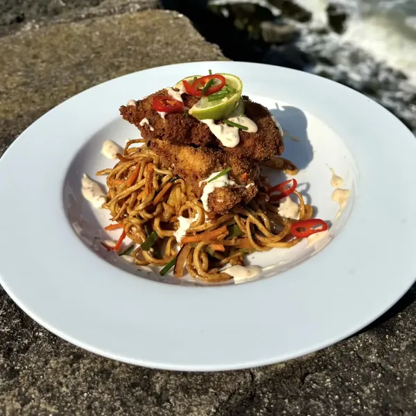Harissa satay noodle salad with crispy chicken, by the sea